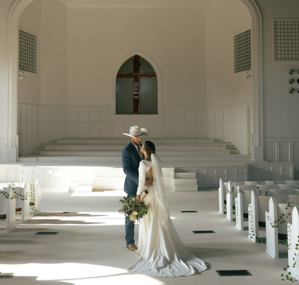 A man and women standing at the end of our chapel